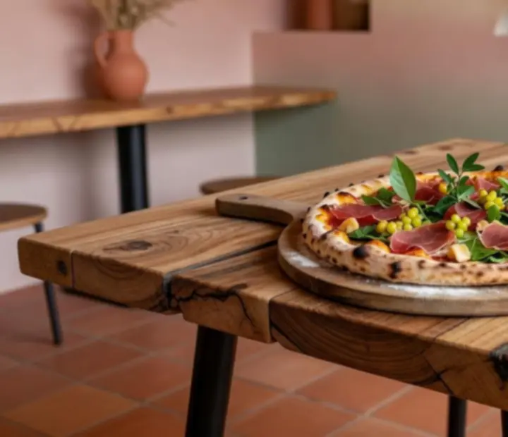 Wood-fired pizza pulled from the oven with fresh Australian toppings